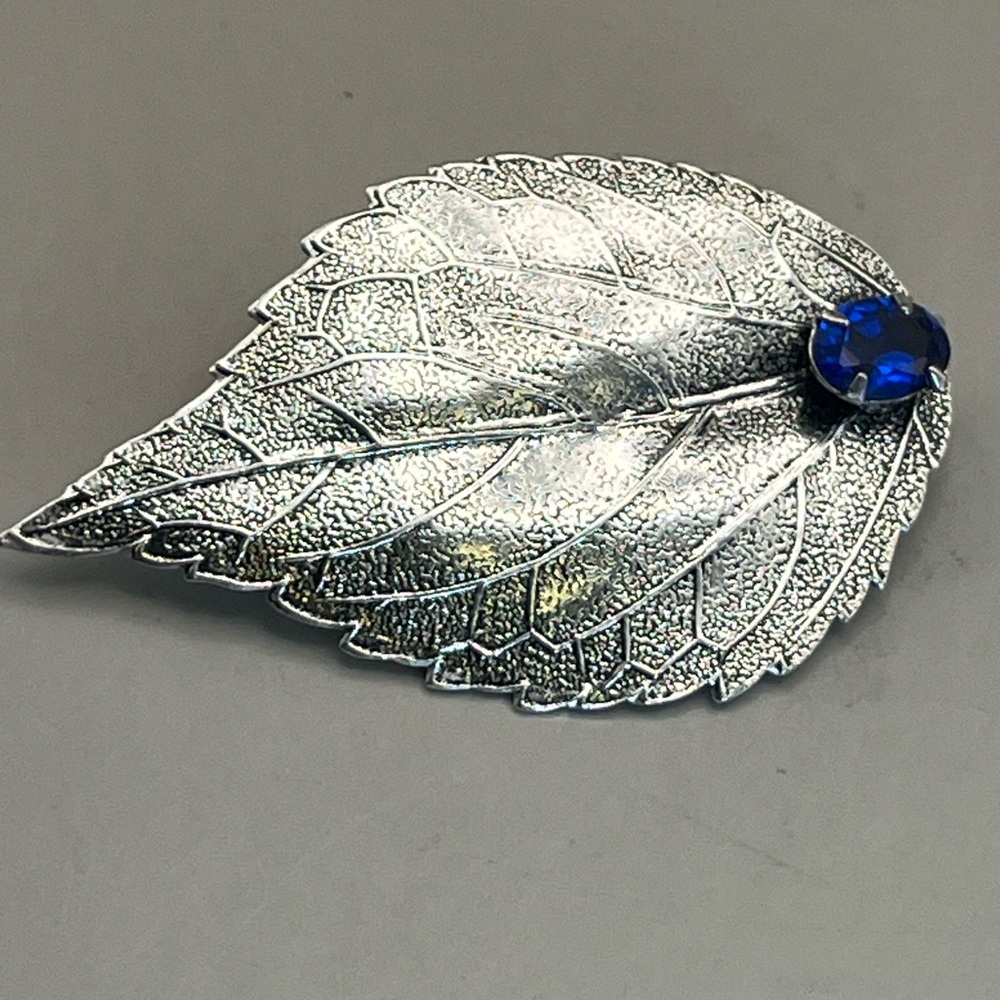 Silver Leaf Brooch with Blue Gem